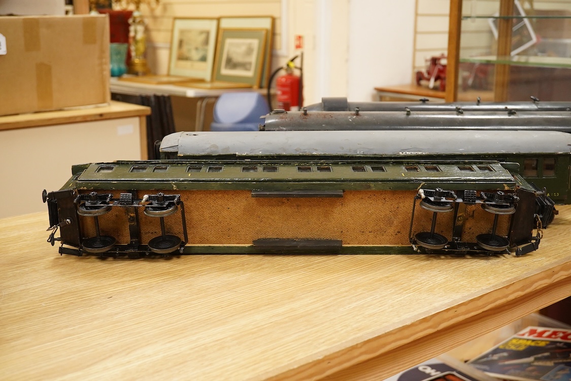 Four Gauge One Continental bogie coaches; two in very dark Green livery, and two ‘Trains Rapides Nord’ in dark green, including some scratch building and possible adaptation from kits